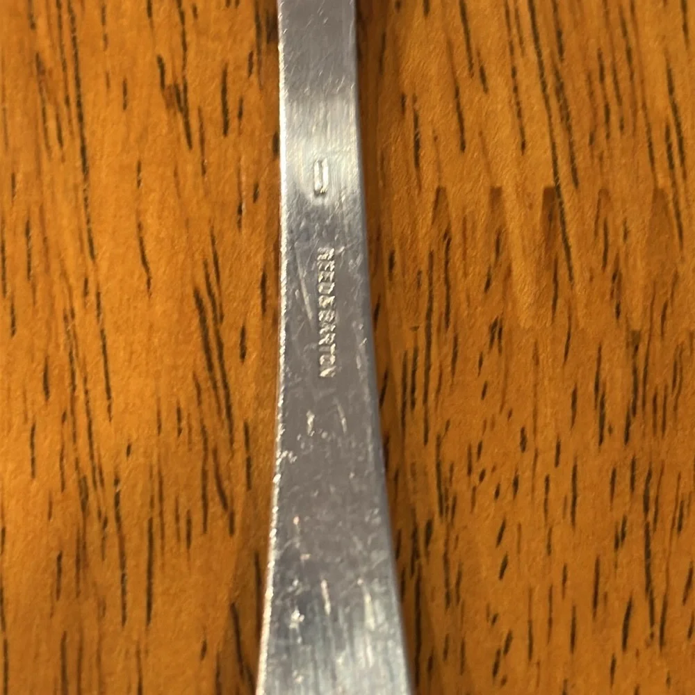 Reed & Barton silver plated serving spoon with “C” monogrammed on the handle.
